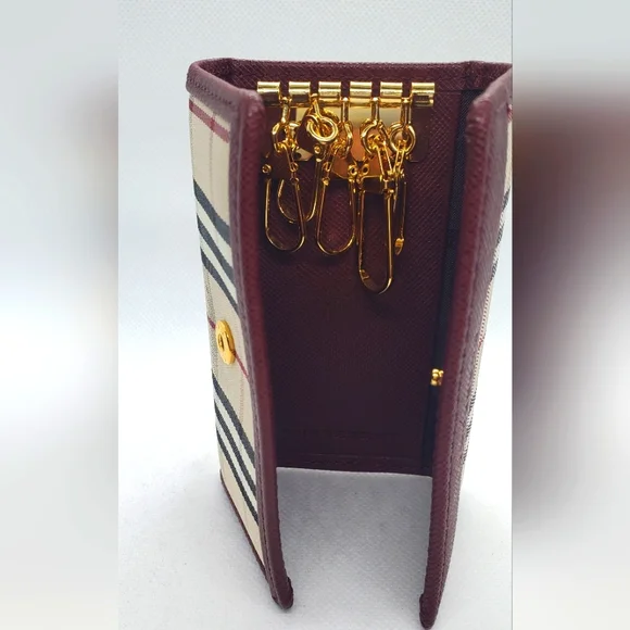 BURBERRY- Burgundy Key Holder with Gold Accents -Like-New -